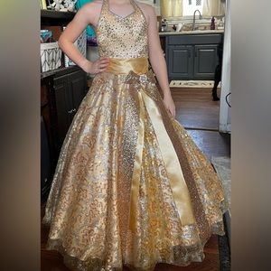 Girls size 10, gold and silver, very sparkly pageant dress